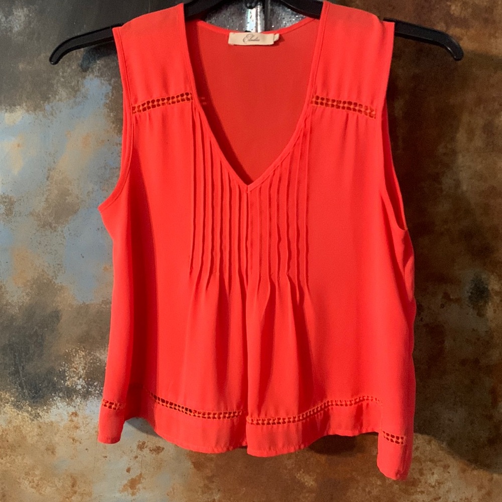 Reddish orange top!